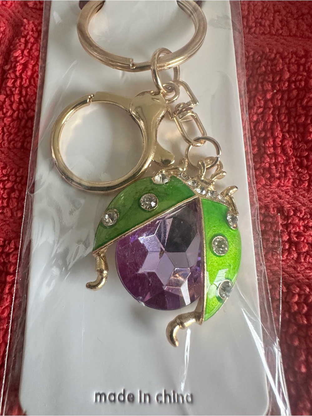 Gold Tone Ladybug Keychain with Green Enamel and Purple Crystal